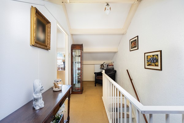 Foto - Te koop: Goed onderhouden tussenwoning in rustige woonwijk!